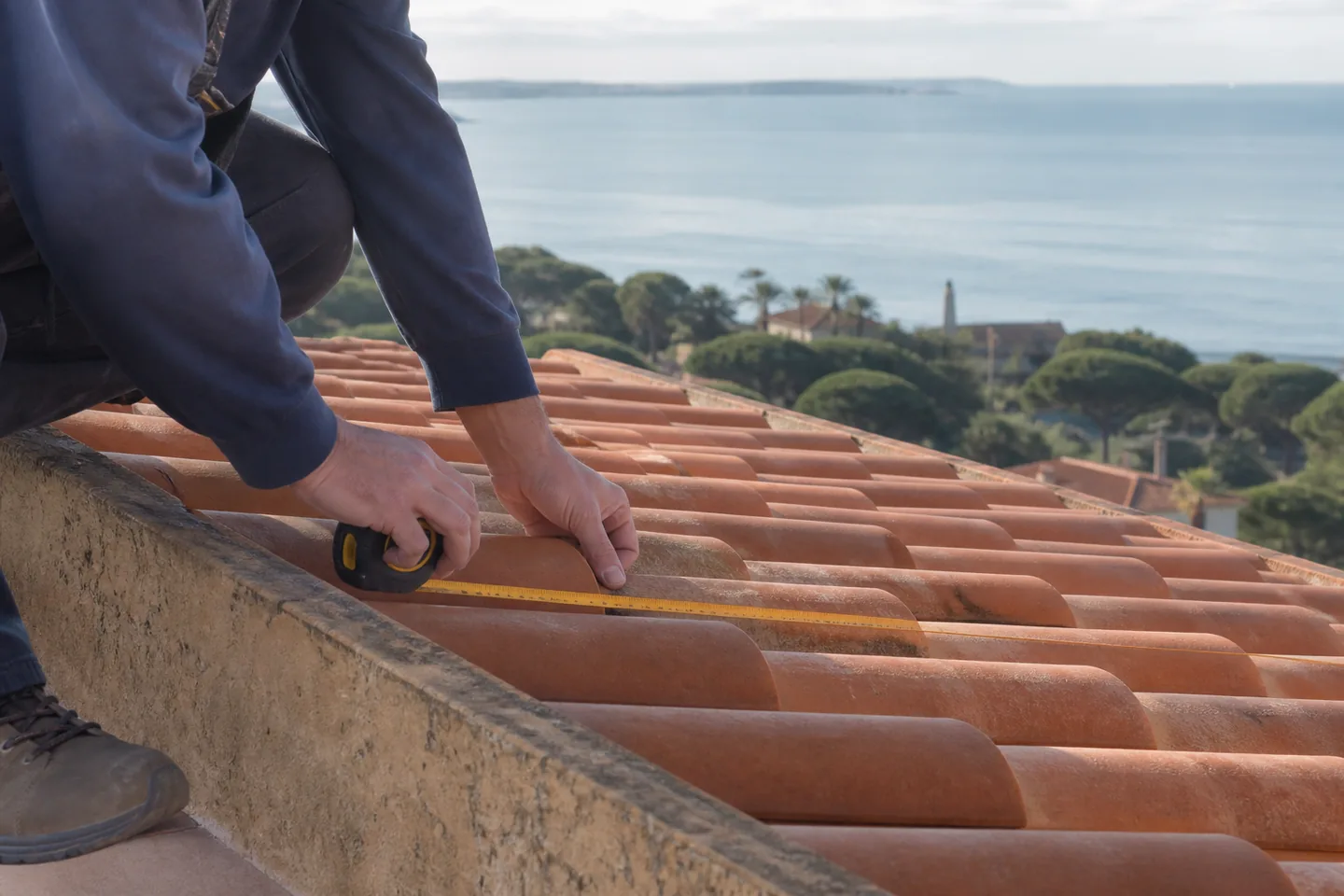 Roof survey measurement on Mediterranean terracotta tiles